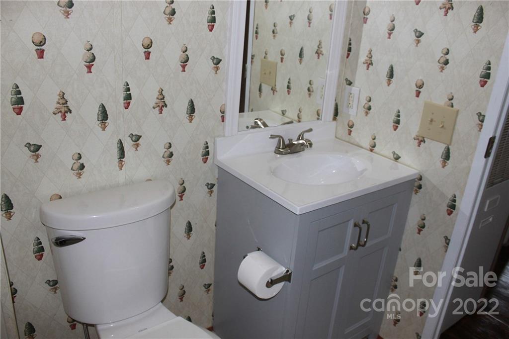 339 Dewitt Owens Road Rutherfordton, NC 28139 - Photo 20 of 48 a bathroom with a sink toilet and shower