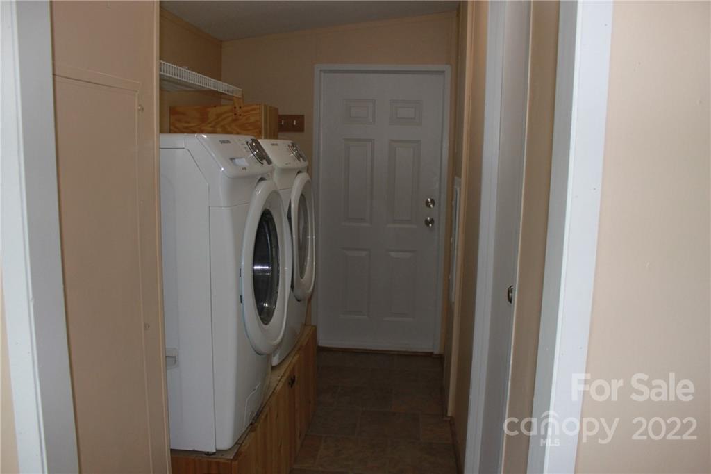 339 Dewitt Owens Road Rutherfordton, NC 28139 - Photo 26 of 48 a utility room with dryer and washer