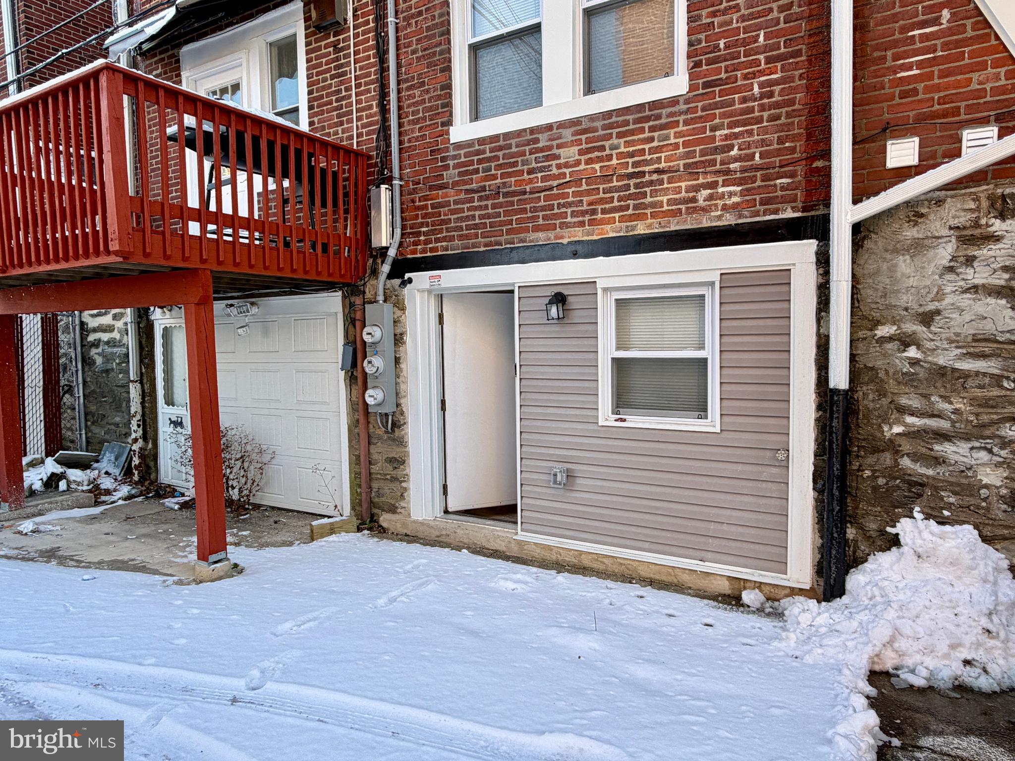 1727 Dallas Street, Unit 1 Philadelphia, PA 19126 - Photo 25 of 25 a view of a house with a patio
