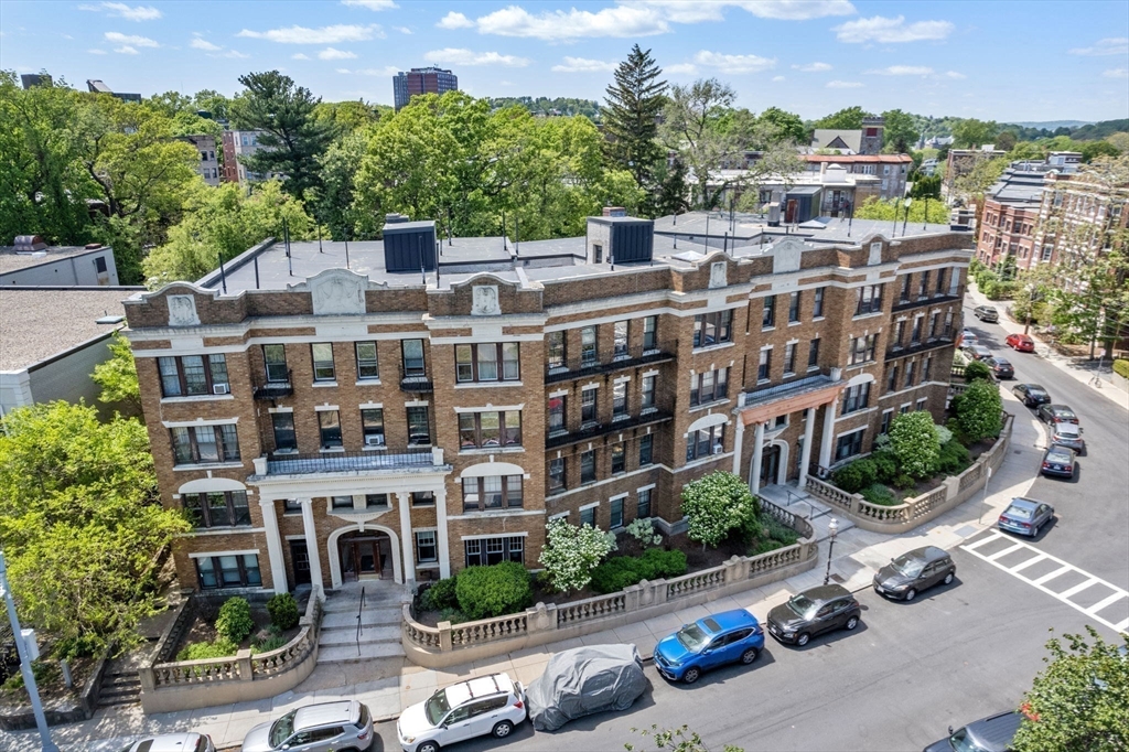 24 Sidlaw Road, Unit 12 Boston, MA 02135 - Photo 13 of 15 a view of a city that has tall buildings