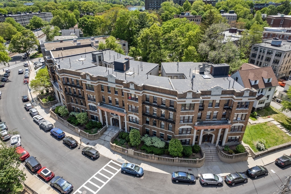 24 Sidlaw Road, Unit 12 Boston, MA 02135 - Photo 14 of 15 an aerial view of a building with garden
