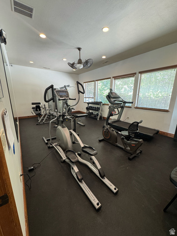 909 South Main Street, Unit F Layton, UT 84041 - Photo 18 of 20 Dedicated exercise room featuring a rubberized floor and recessed lighting