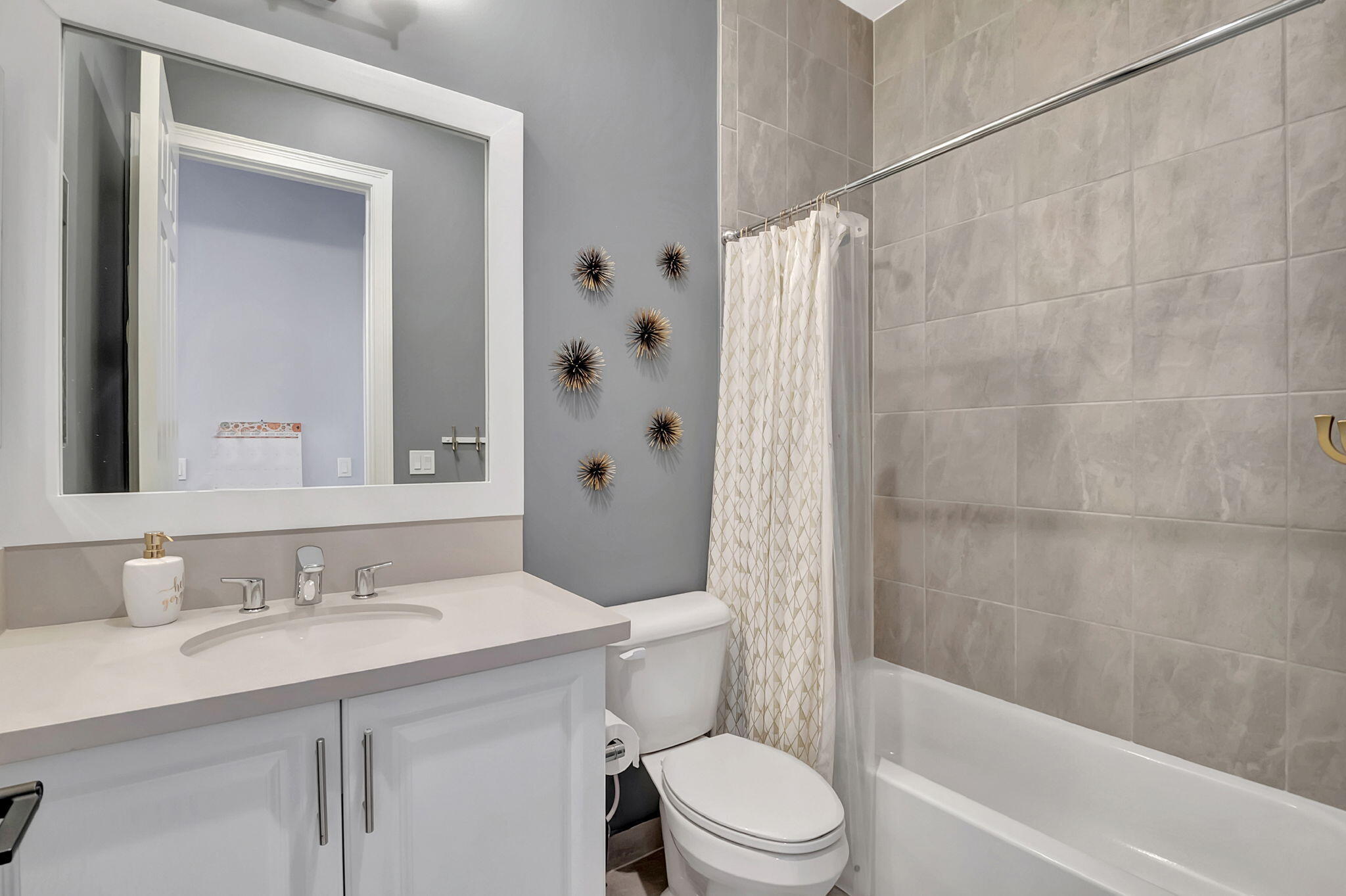 17353 Santaluce Manor Boca Raton, FL 33496 - Photo 33 of 67 a bathroom with a granite countertop sink a toilet and shower