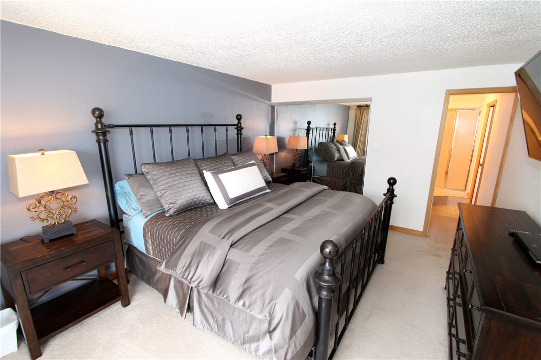760 Copper Road, Unit 106 Copper Mountain, CO 80443 - Photo 14 of 23 Master bedroom with closet and seperate bath.