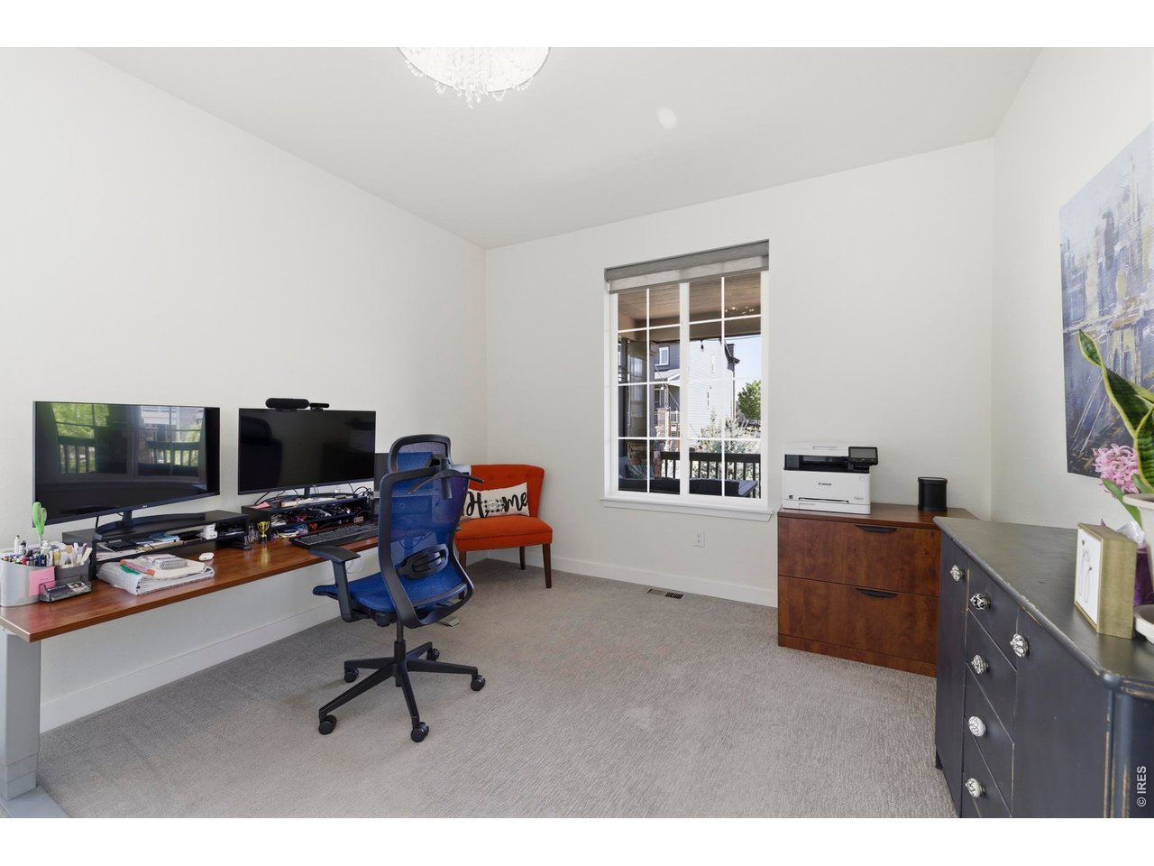 2910 Water View Street Timnath, CO 80547 - Photo 17 of 50 a view of a workspace with furniture and a window