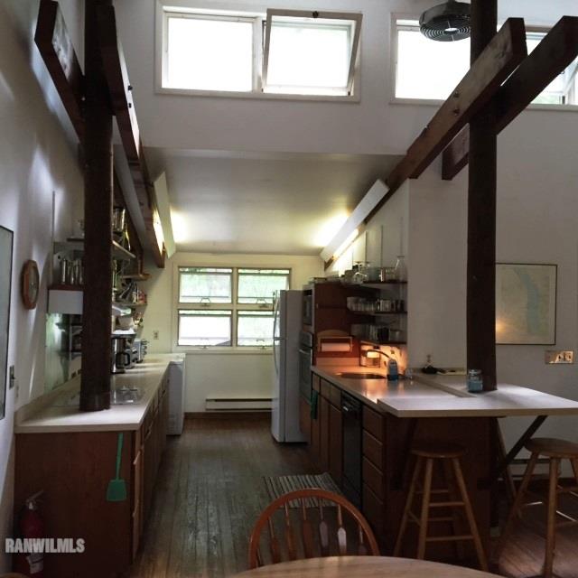 8540 West Diggin Hill Road Hanover, IL 61041 - Photo 6 of 25 a kitchen with sink and cabinets