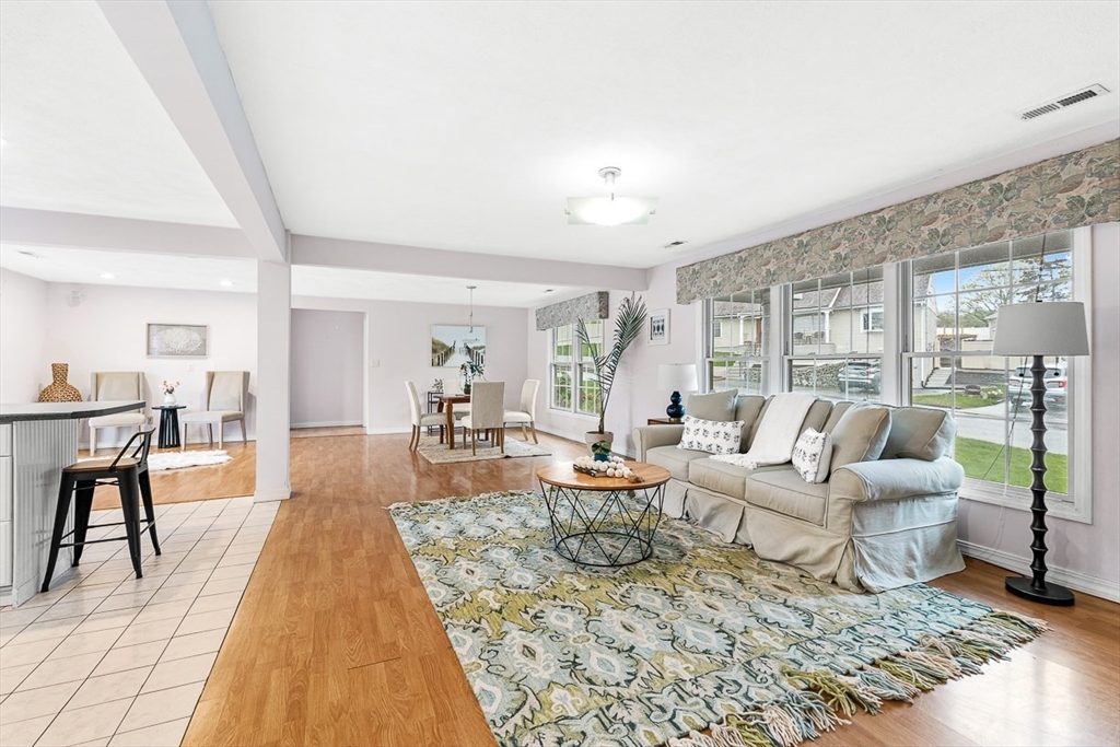 3 Theresa Road Stoneham, MA 02180 - Photo 12 of 42 a living room with furniture and a rug