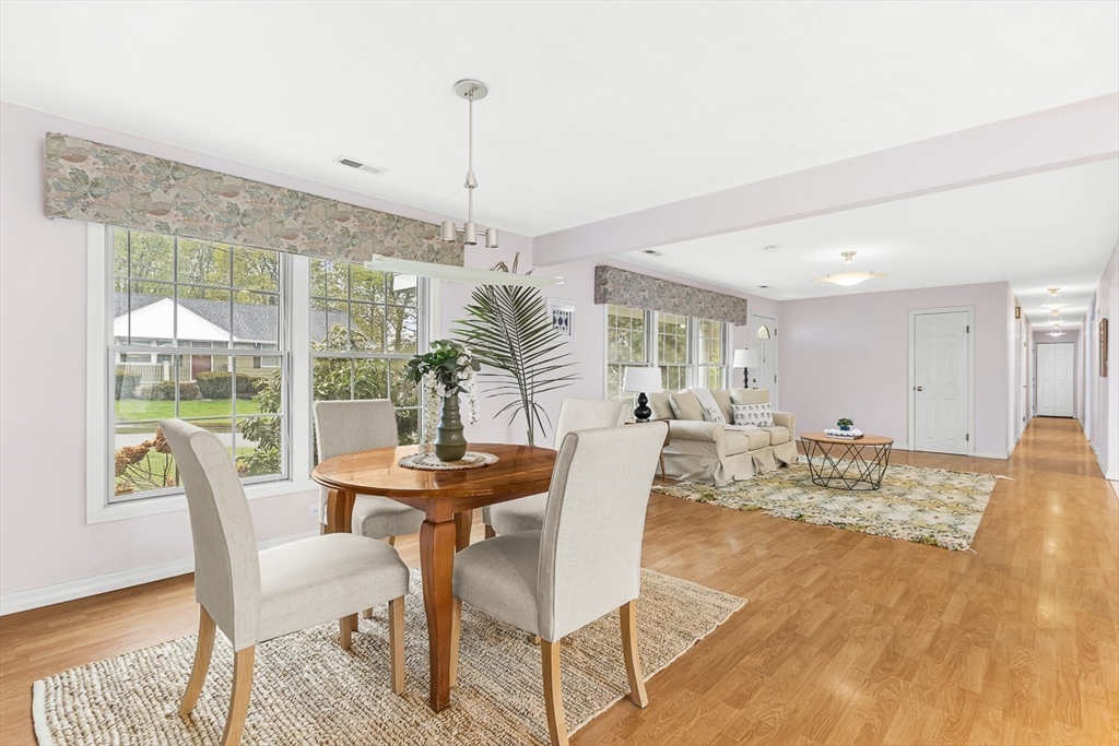 3 Theresa Road Stoneham, MA 02180 - Photo 15 of 42 a view of a dining room with furniture window and wooden floor