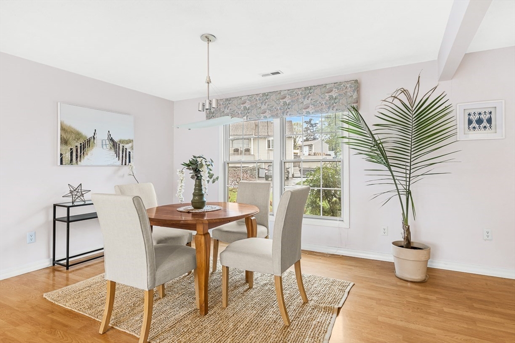 3 Theresa Road Stoneham, MA 02180 - Photo 16 of 42 a view of a dining room with furniture window and wooden floor