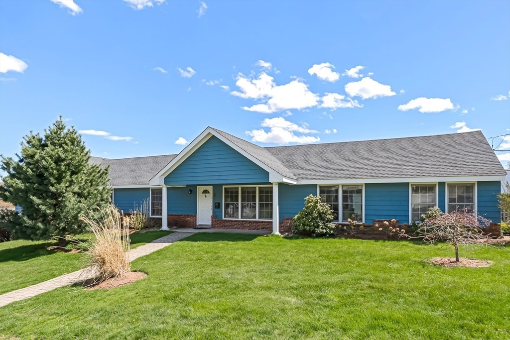 3 Theresa Road Stoneham, MA 02180 - Photo 2 of 42 a front view of house with yard and green space
