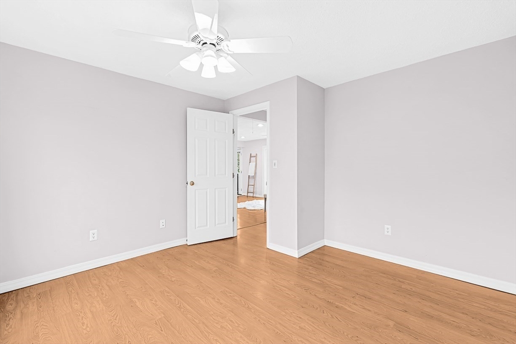 3 Theresa Road Stoneham, MA 02180 - Photo 29 of 42 a view of an empty room with wooden floor