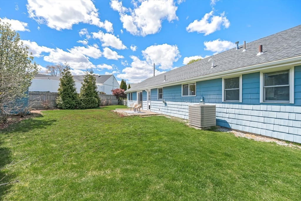 3 Theresa Road Stoneham, MA 02180 - Photo 35 of 42 a view of a house with a backyard