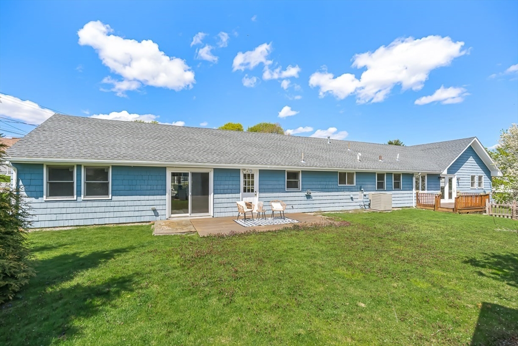 3 Theresa Road Stoneham, MA 02180 - Photo 36 of 42 a front view of house with yard and green space