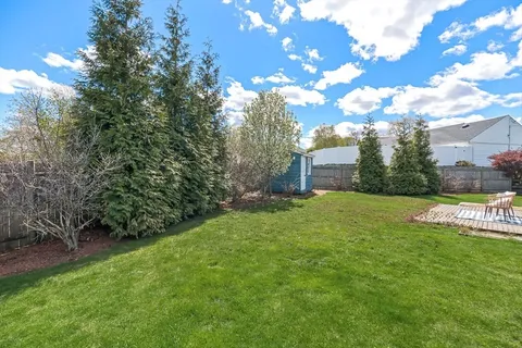 a view of a backyard with a garden