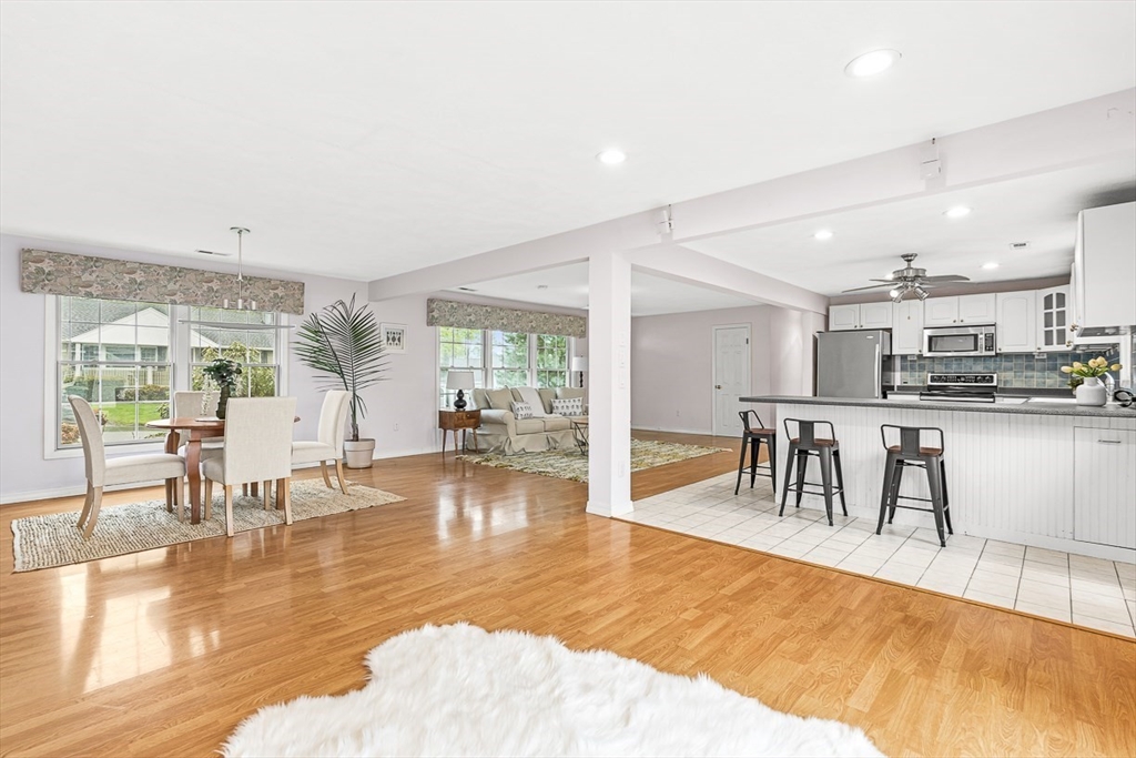 3 Theresa Road Stoneham, MA 02180 - Photo 9 of 42 a dining room with furniture and wooden floor