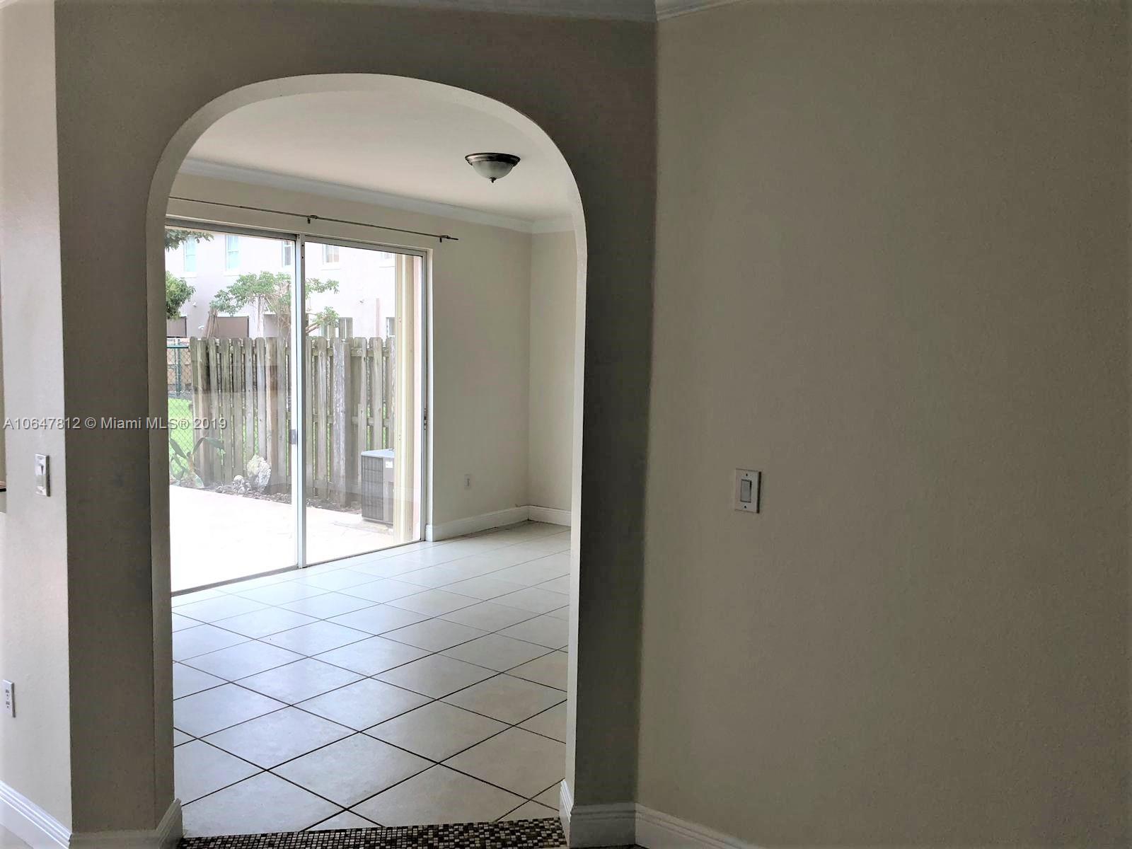 27293 Southwest 138th Path Homestead, FL 33032 - Photo 2 of 19 a view of entryway with wooden floor