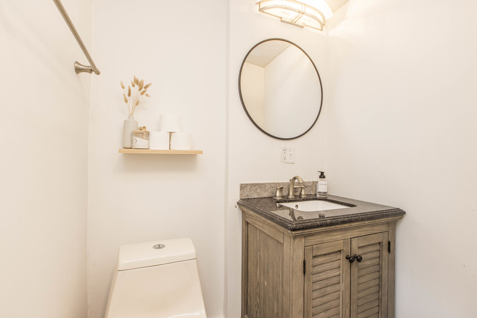22 Broadway Place Normal, IL 61761 - Photo 11 of 36 a bathroom with a sink and a mirror