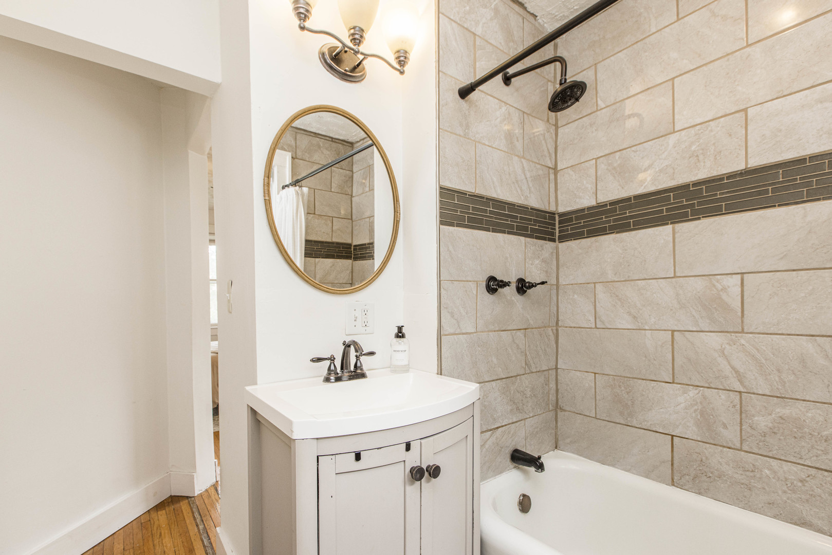 22 Broadway Place Normal, IL 61761 - Photo 22 of 36 a bathroom with a sink and a mirror