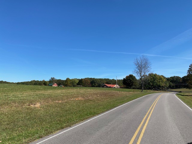0 Hogan Road Burns, TN 37029 - Photo 15 of 27 a view of a lake with a big yard