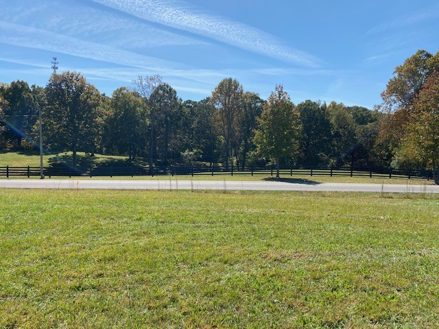 0 Hogan Road Burns, TN 37029 - Photo 25 of 27 a view of a swimming pool with an outdoor space and seating area