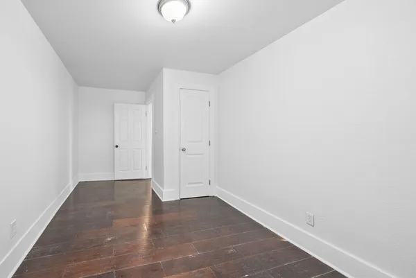 a living room with furniture or couch and a flat screen tv