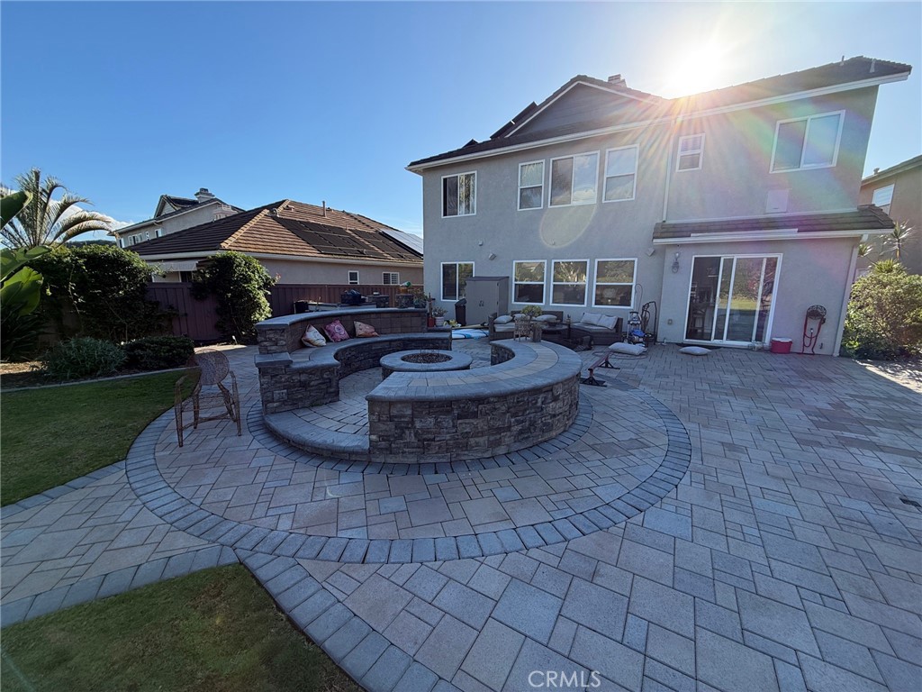 3918 Rill Court Carlsbad, CA 92010 - Photo 15 of 19 a view of a house with backyard and sitting area