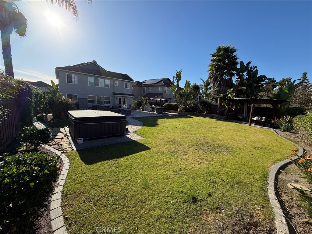 3918 Rill Court Carlsbad, CA 92010 - Photo 17 of 19 a swimming pool with outdoor seating and yard