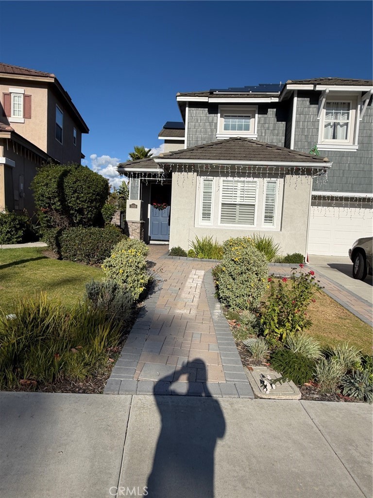 3918 Rill Court Carlsbad, CA 92010 - Photo 2 of 19 a front view of a house with a yard
