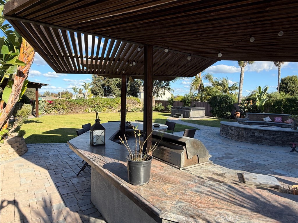3918 Rill Court Carlsbad, CA 92010 - Photo 9 of 19 a view of a swimming pool with a patio