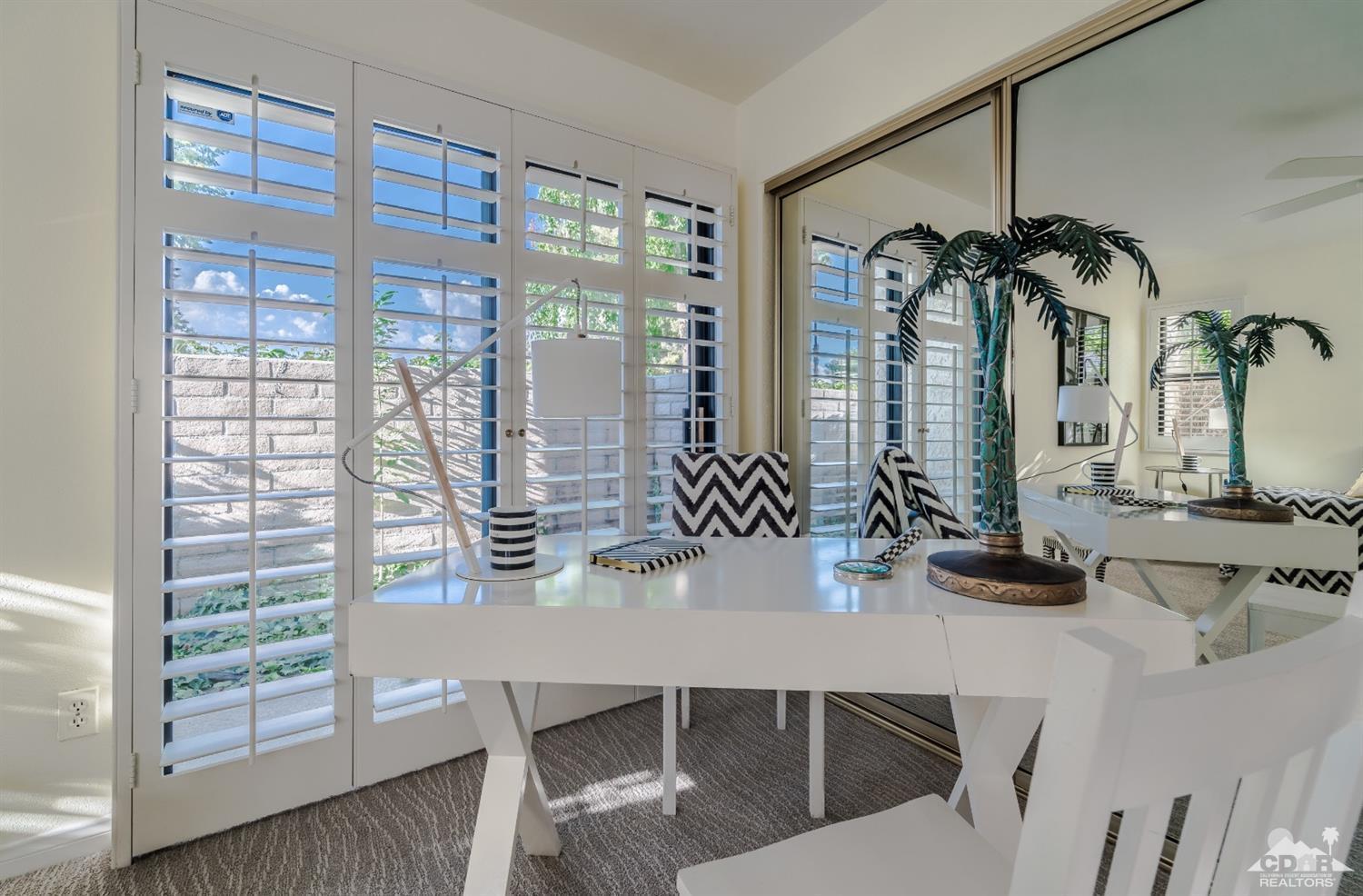 8 Kevin Lee Lane Rancho Mirage, CA 92270 - Photo 17 of 21 a dining room with furniture and window