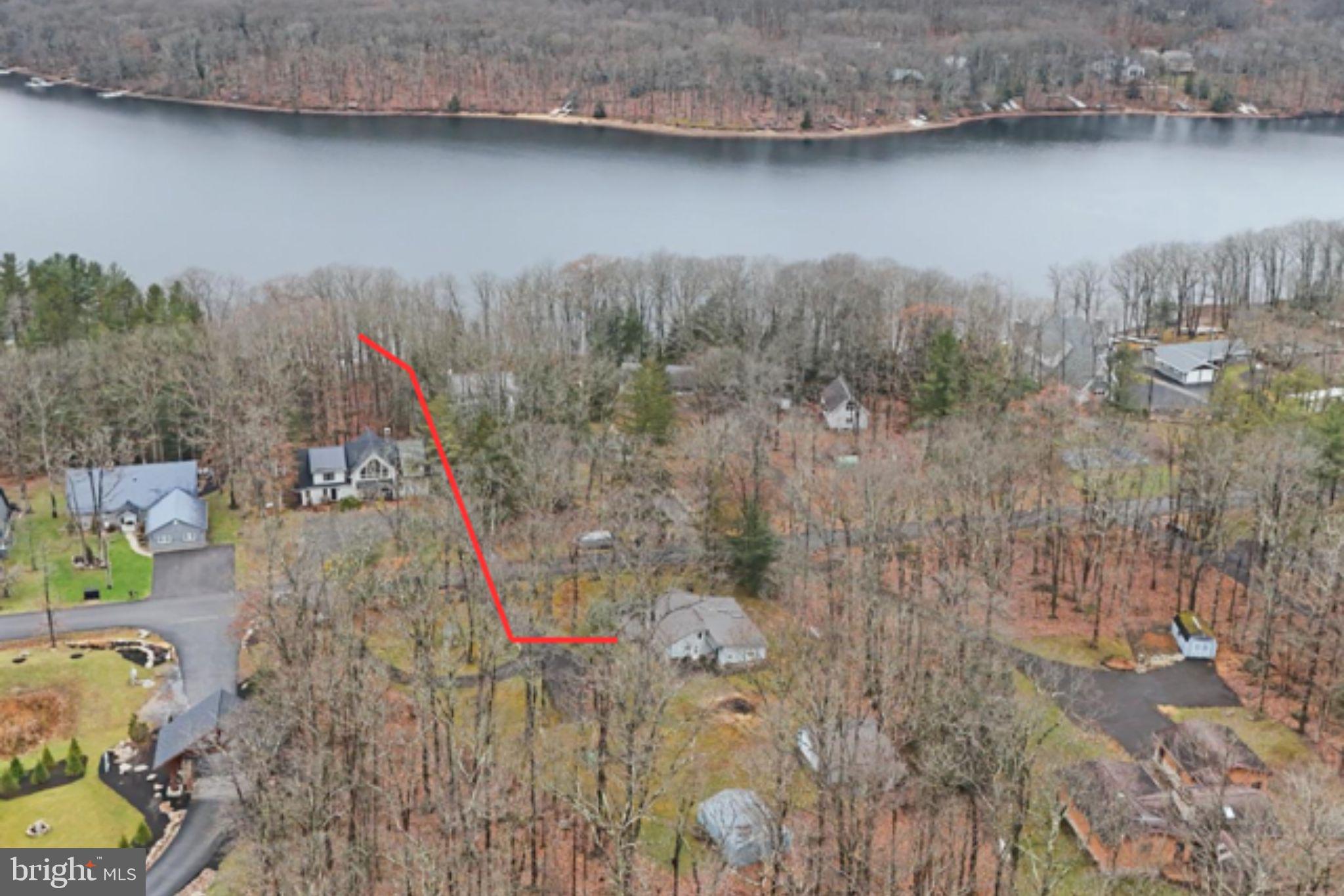 222 Skippers Point Road Oakland, MD 21550 - Photo 1 of 59 a view of a wooden bridge