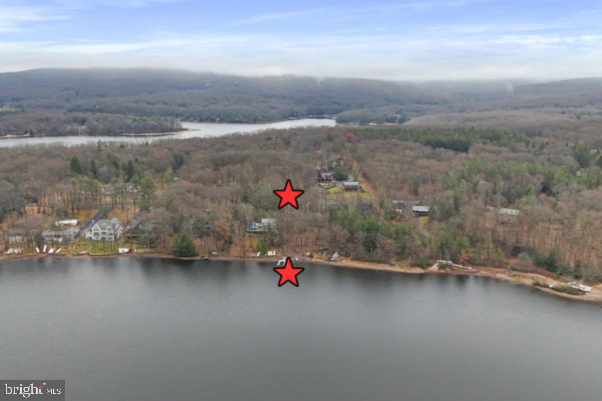 222 Skippers Point Road Oakland, MD 21550 - Photo 2 of 59 an aerial view of a houses with city space
