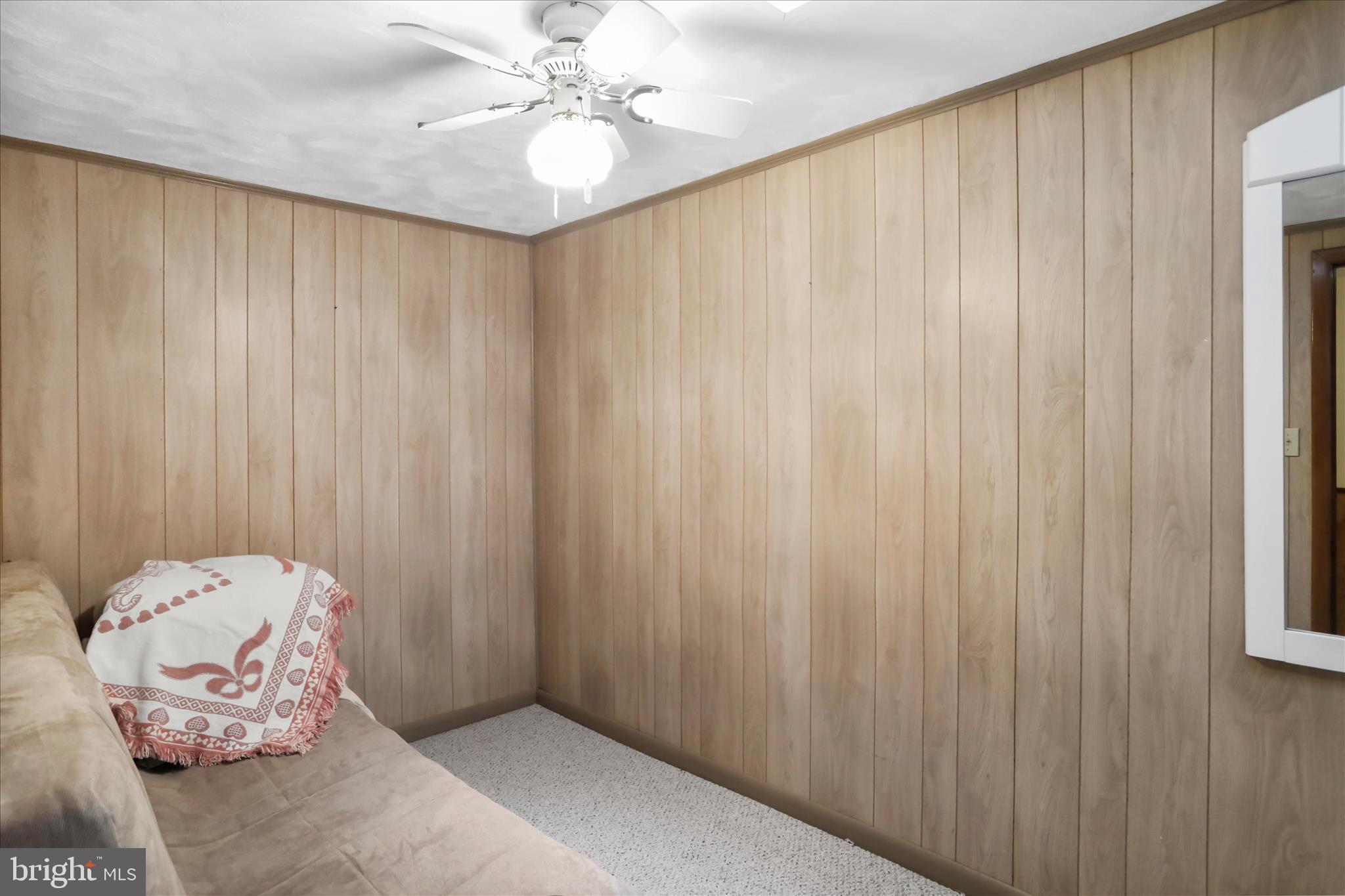 222 Skippers Point Road Oakland, MD 21550 - Photo 22 of 59 a bedroom with a bed and a window