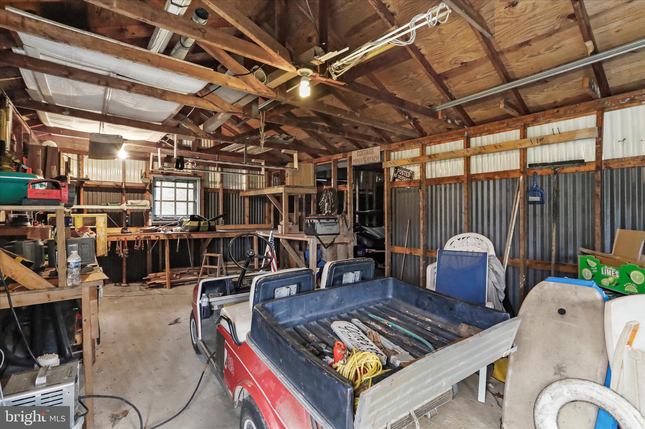 222 Skippers Point Road Oakland, MD 21550 - Photo 30 of 59 a view of a chairs and table in a patio
