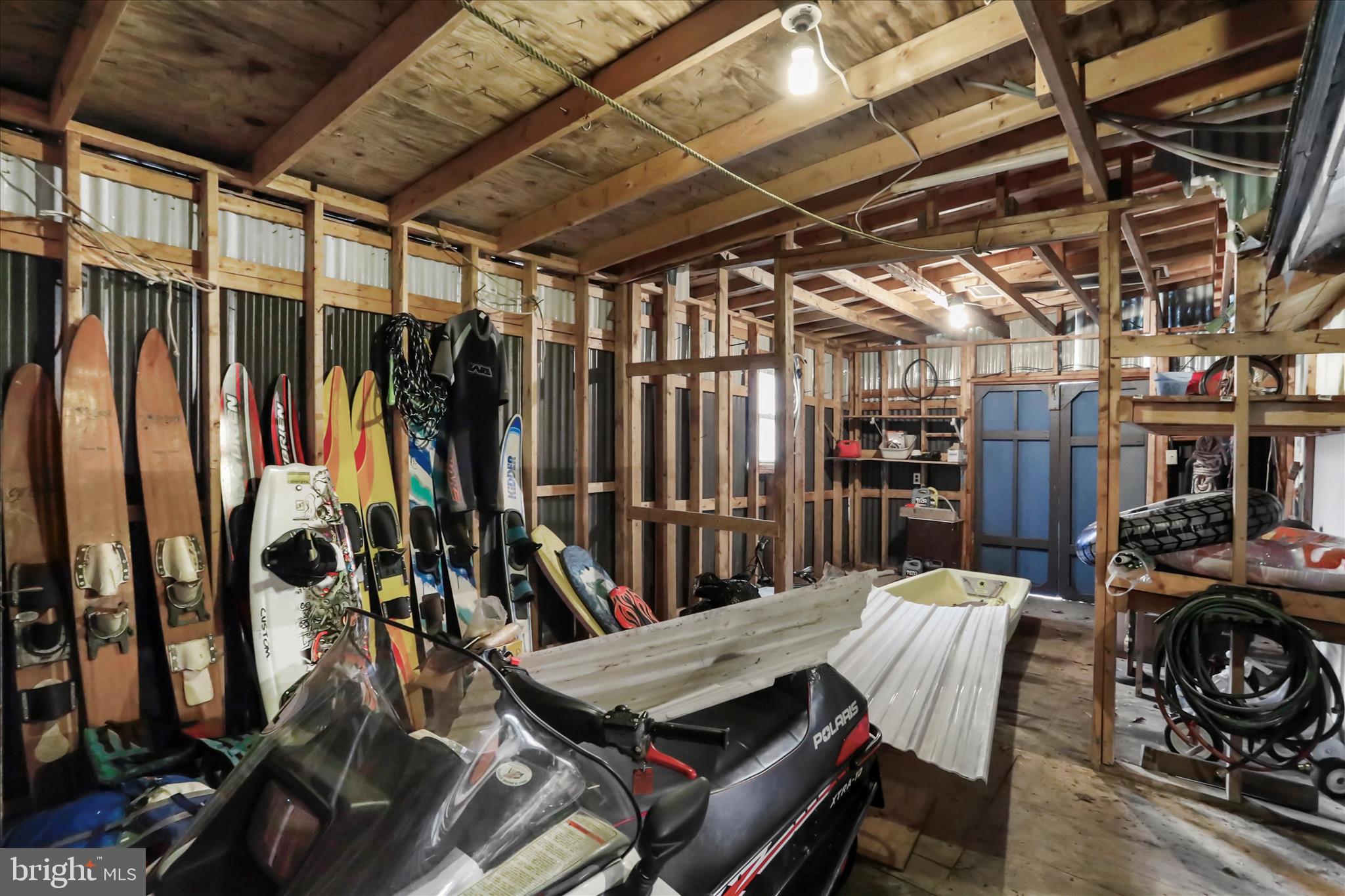 222 Skippers Point Road Oakland, MD 21550 - Photo 31 of 59 a view of a chairs and table in a patio