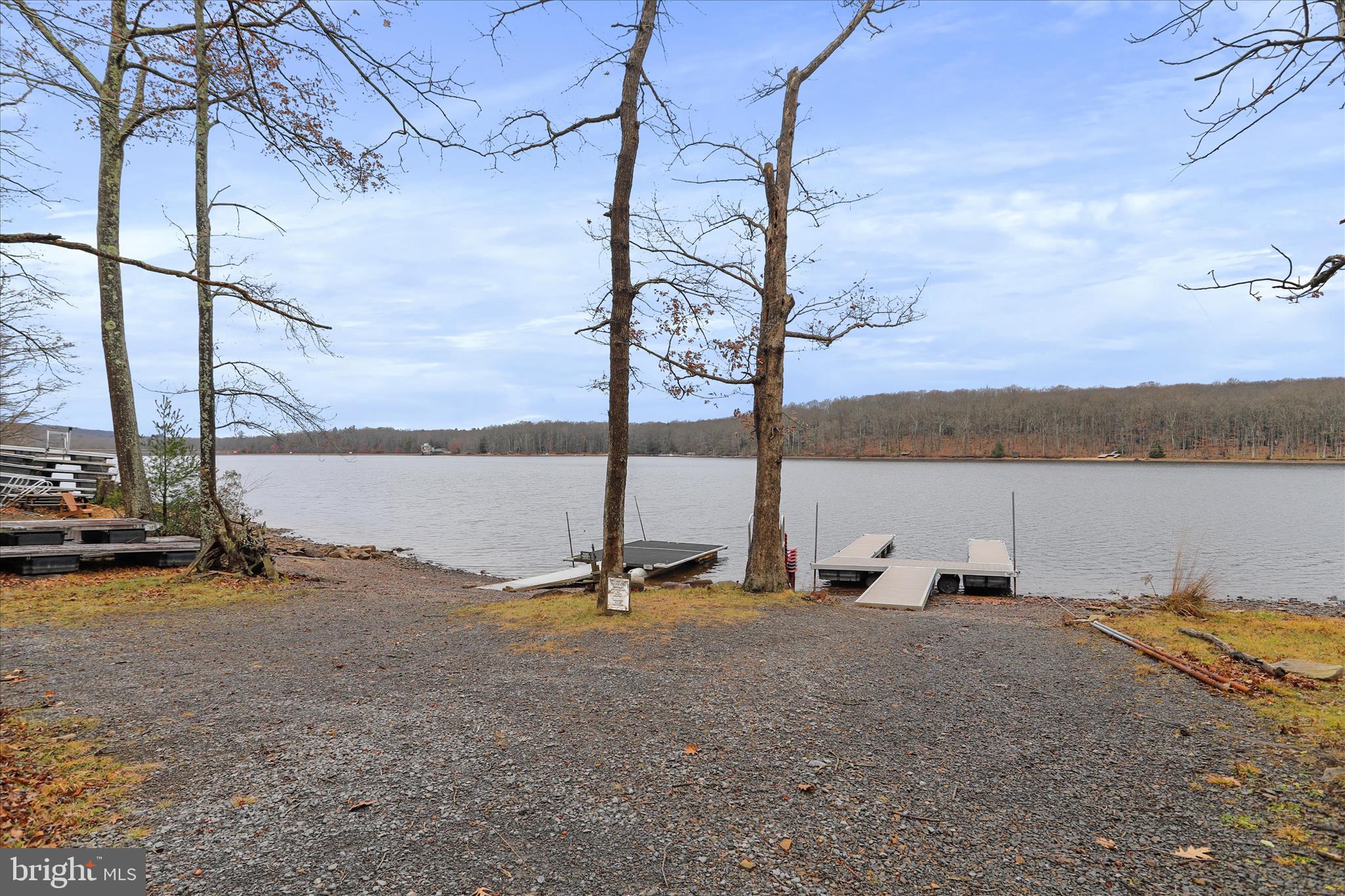 222 Skippers Point Road Oakland, MD 21550 - Photo 4 of 59 level lake front with dock.