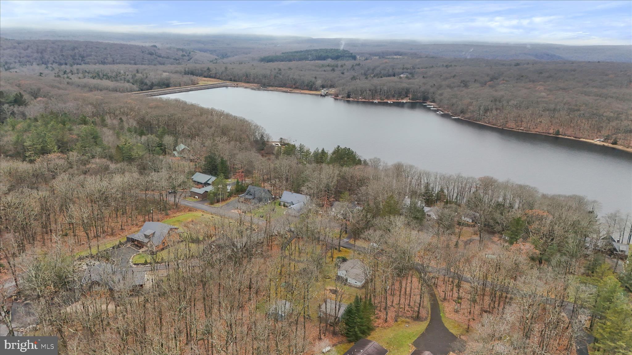 222 Skippers Point Road Oakland, MD 21550 - Photo 43 of 59 a view of a lake with mountain
