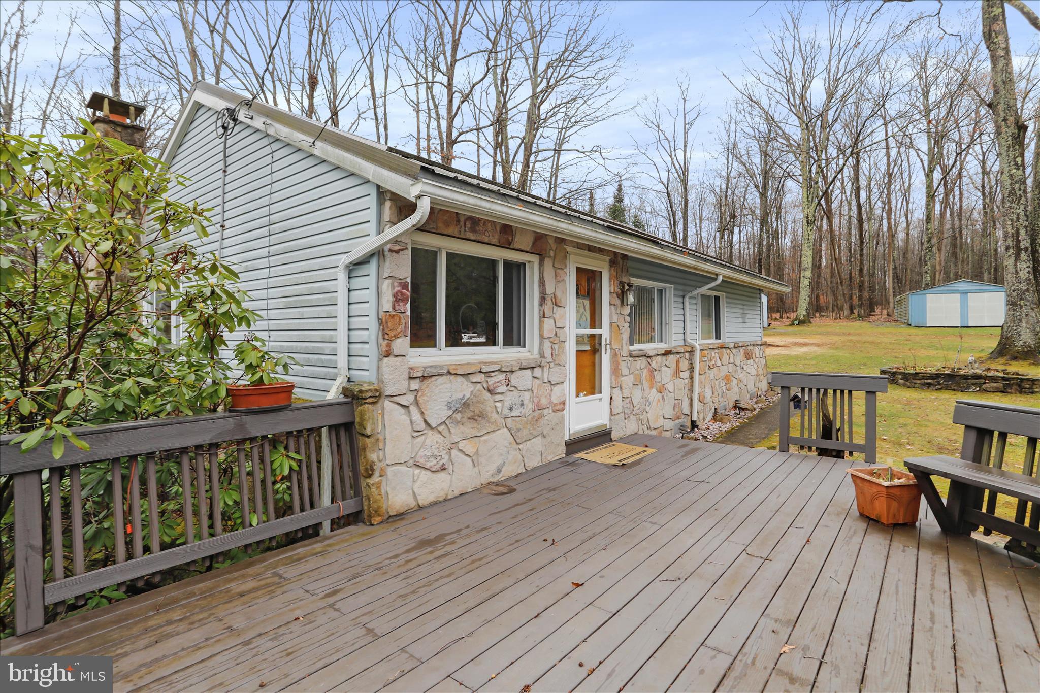 222 Skippers Point Road Oakland, MD 21550 - Photo 7 of 59 a front view of a house with balcony