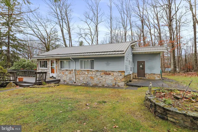 a kitchen with refrigerator cabinets and a refrigerator