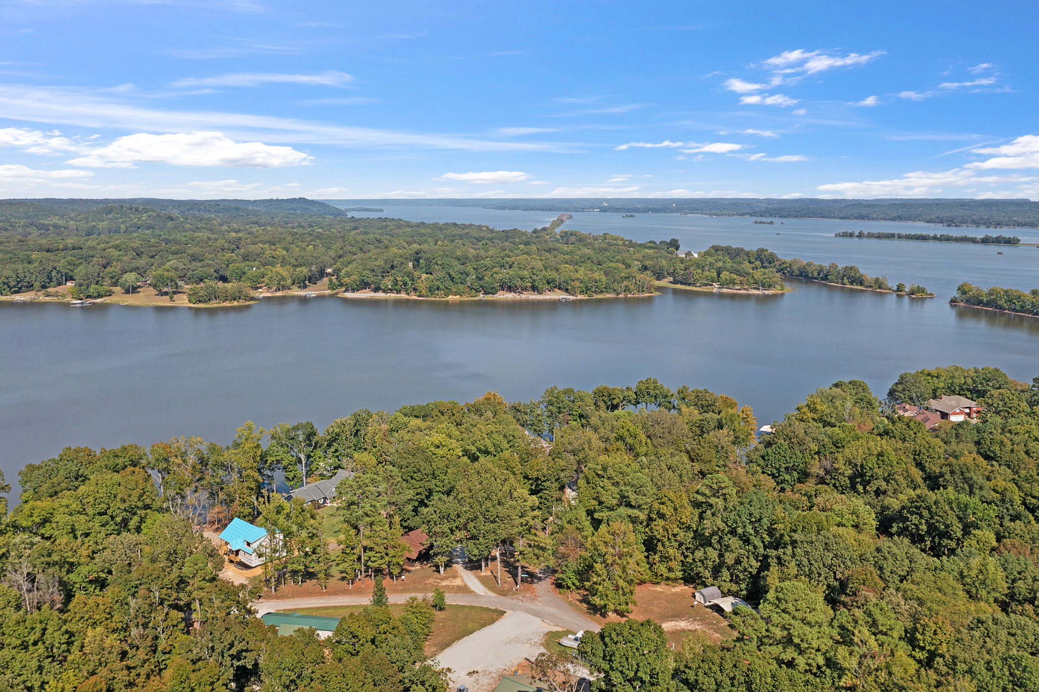 44 G & S Rock Ranch Road Camden, TN 38320 - Photo 2 of 23 a view of a lake with a mountain