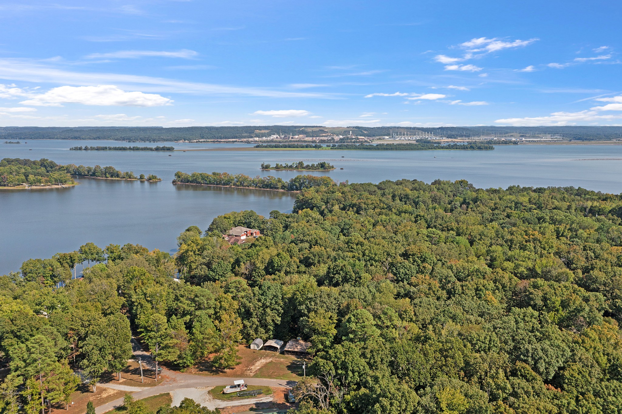 44 G & S Rock Ranch Road Camden, TN 38320 - Photo 4 of 23 a view of a lake with a city