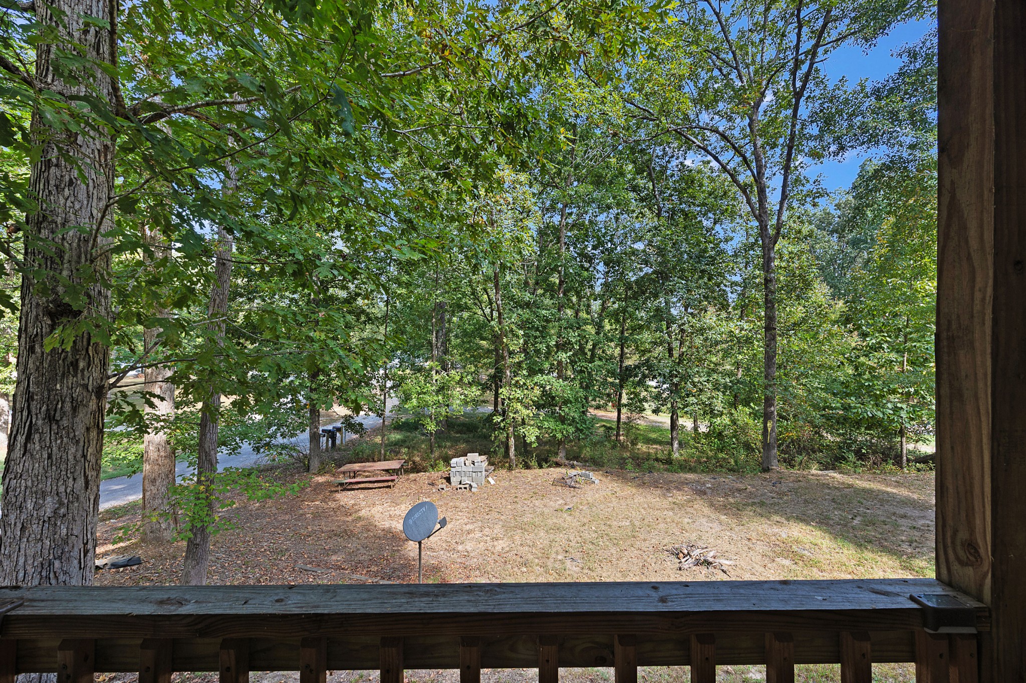 44 G & S Rock Ranch Road Camden, TN 38320 - Photo 8 of 23 a view of a wooden street from a window