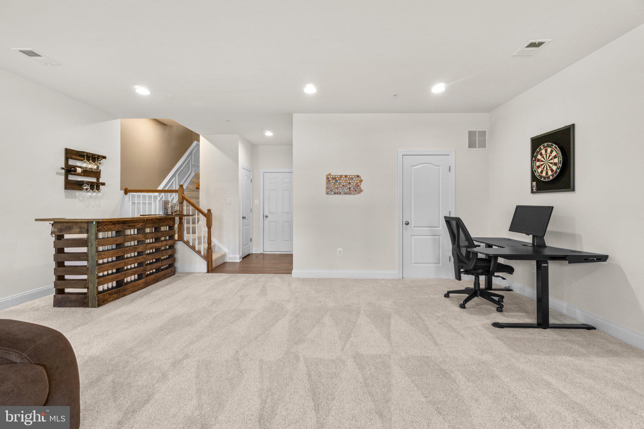 9644 Bothwell Lane Frederick, MD 21704 - Photo 44 of 68 Rec room, foyer to garage, full bathroom