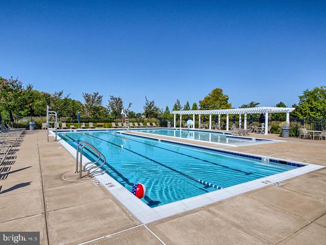 9644 Bothwell Lane Frederick, MD 21704 - Photo 57 of 68 a view of swimming pool with a back yard