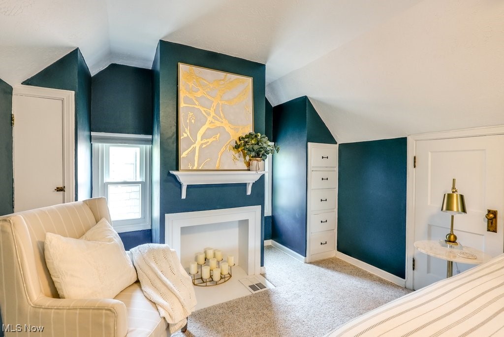2340 Canterbury Road University Heights, OH 44118 - Photo 22 of 29 Bedroom featuring baseboards, carpet flooring, lofted ceiling, and visible vents