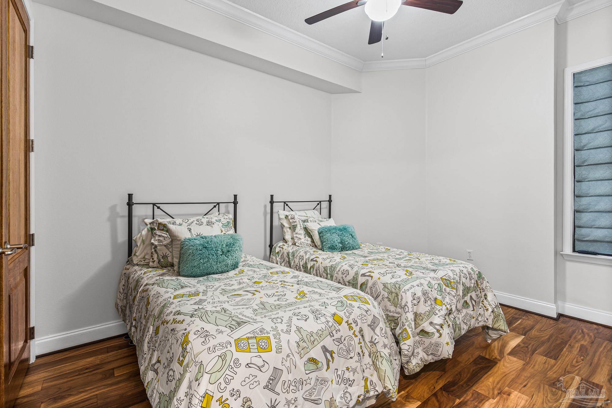 14900 River Road, Unit 904 Perdido Key, FL 32507 - Photo 19 of 62 a bedroom with two beds and a chandelier