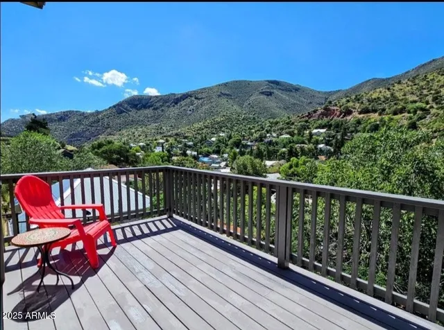 a balcony with an outdoor space