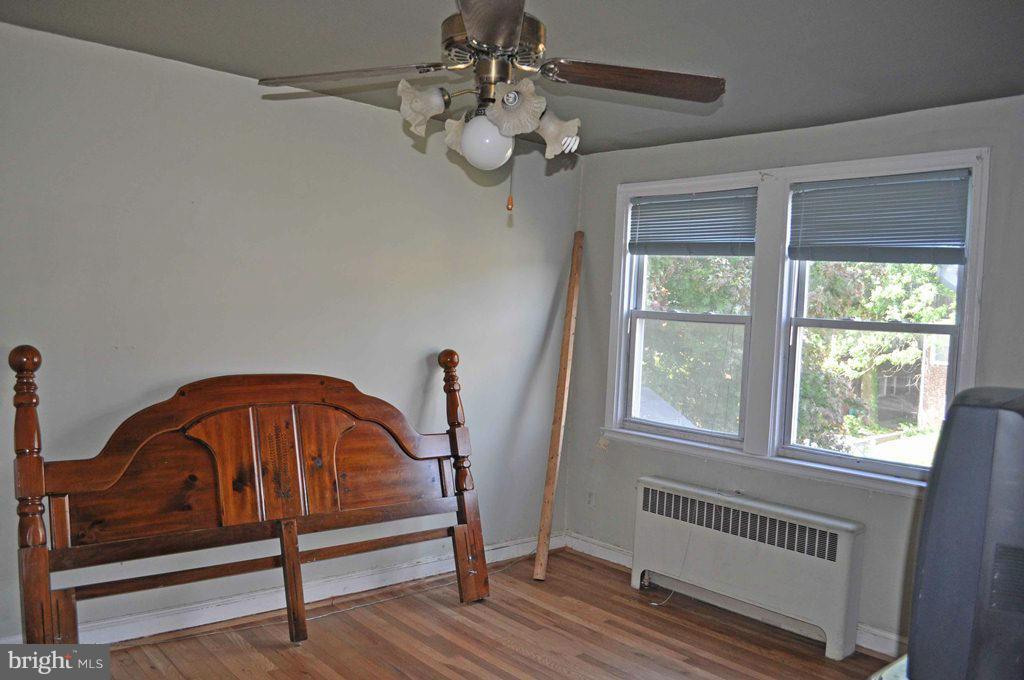 121 Cherrydell Road Catonsville, MD 21228 - Photo 14 of 20 a view of staircase with wooden floor