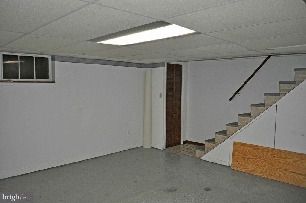 121 Cherrydell Road Catonsville, MD 21228 - Photo 17 of 20 a view of an empty room with stairs