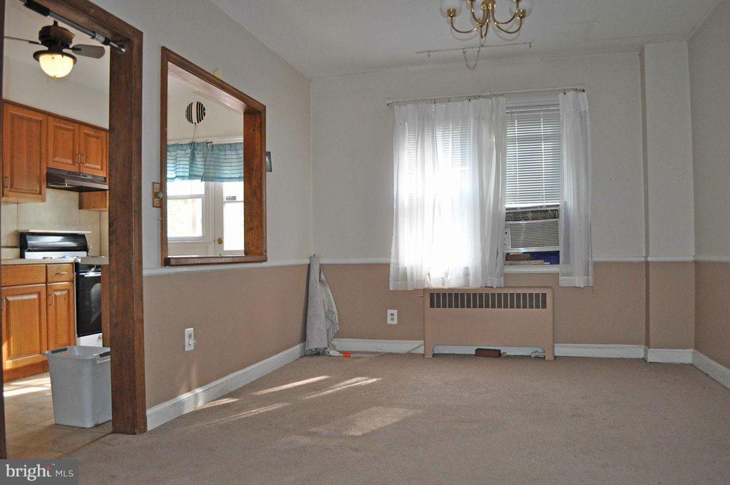 121 Cherrydell Road Catonsville, MD 21228 - Photo 7 of 20 wooden floor and window in a room
